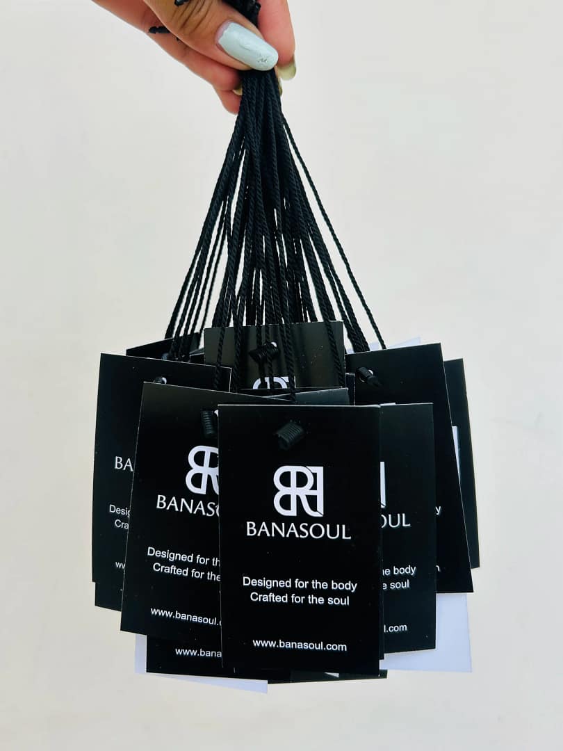 Custom square paper hang tag for clothing with logo design, printed in full color on 300 GSM